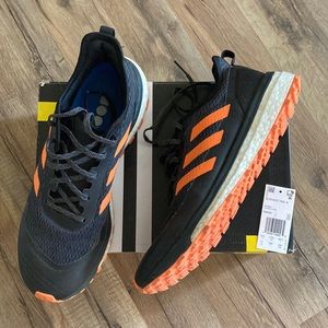 Adidas Boost response trail m running shoe men’s 11 black white orange